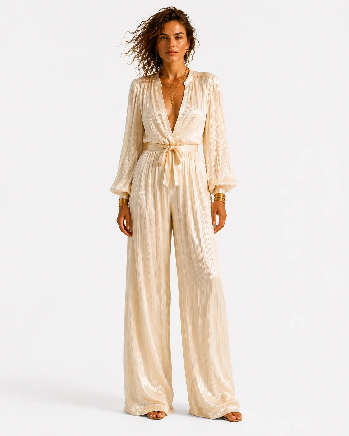 Front studio view of cream pleated silk jumpsuit.