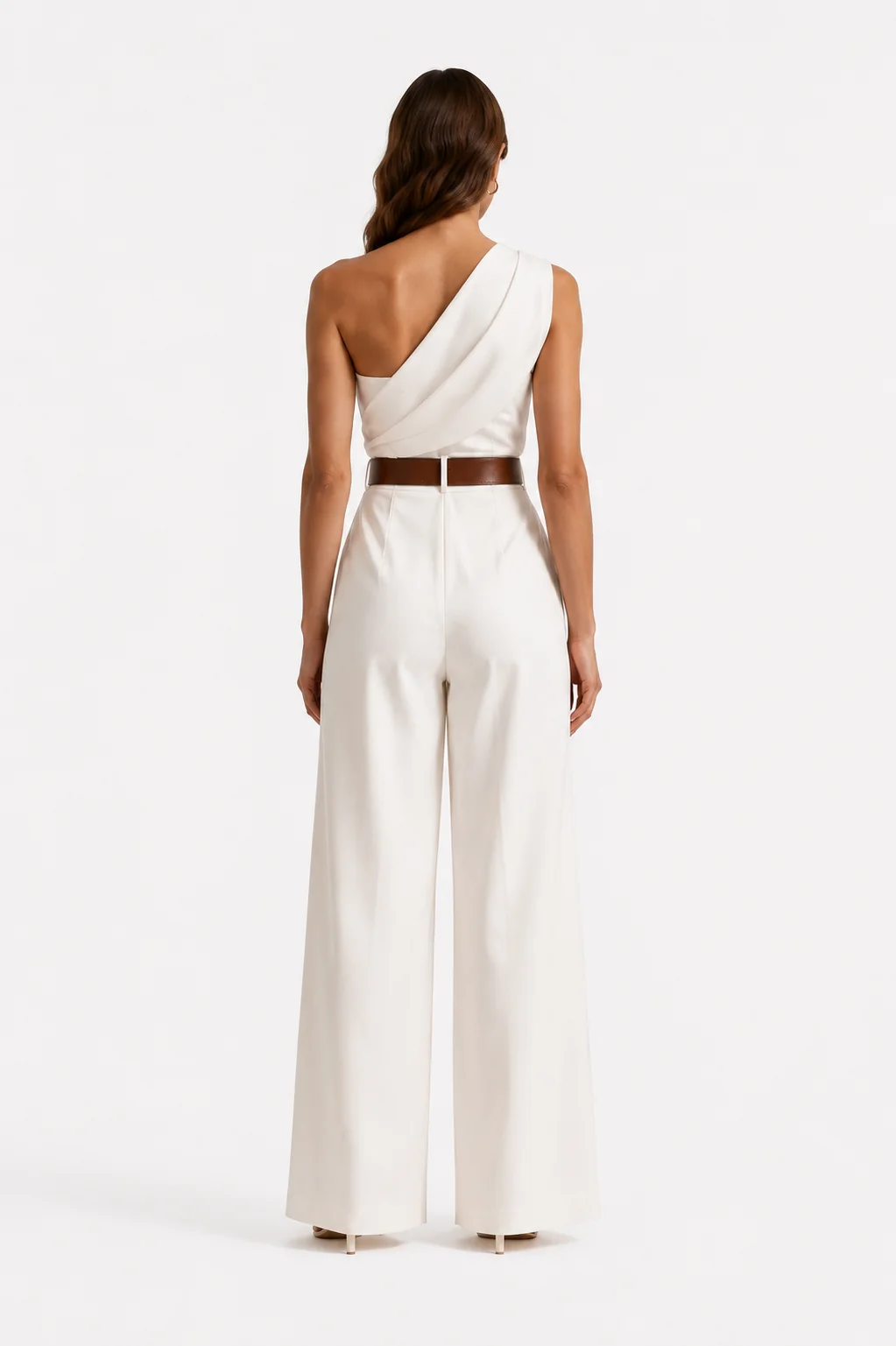 Back studio image of a white one-shoulder jumpsuit shown full length.