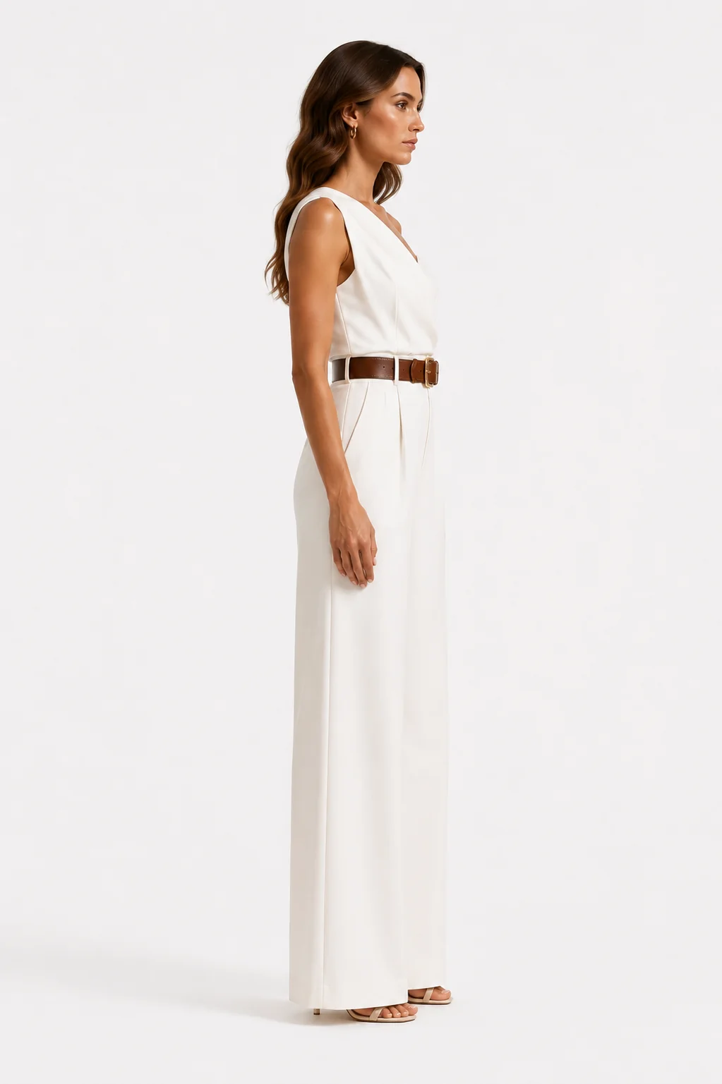 Side studio image of a white one-shoulder jumpsuit shown full length.